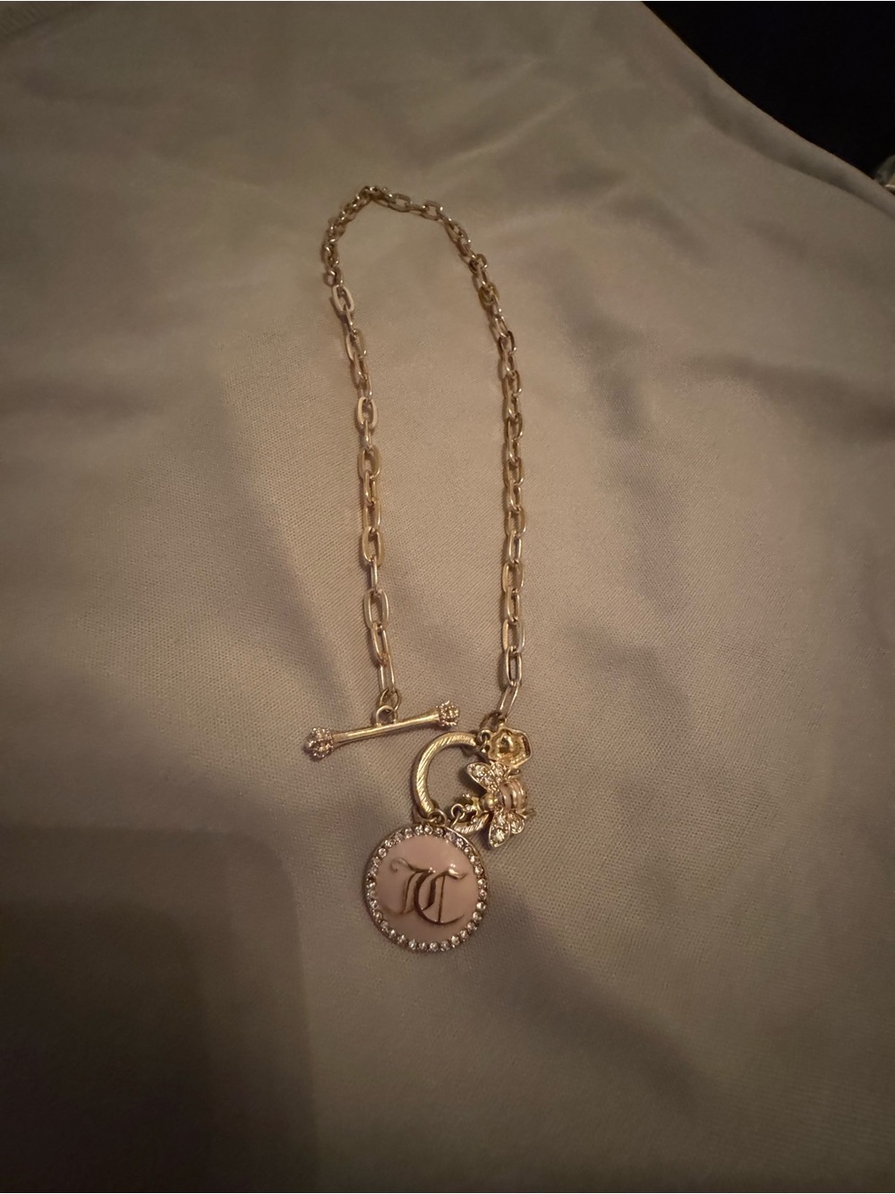 Juicy Couture Gold-Tone Toggle Necklace with Initial and Flower Charms